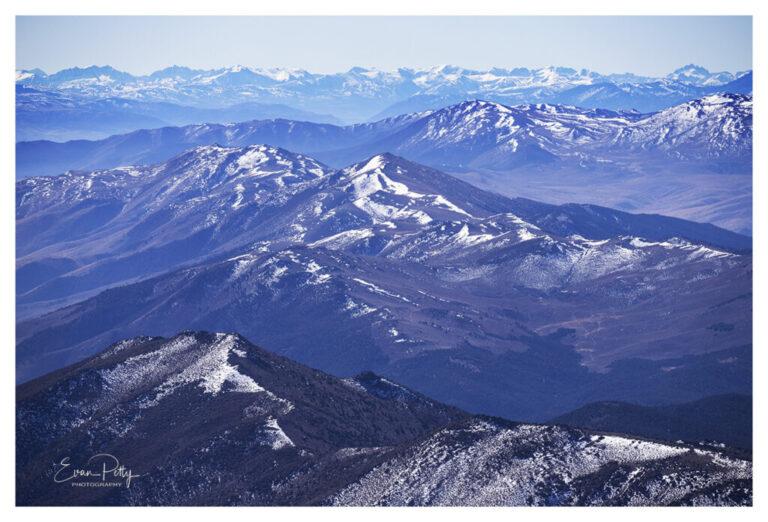 Aerial View of Snowy Sierra Mountain Range