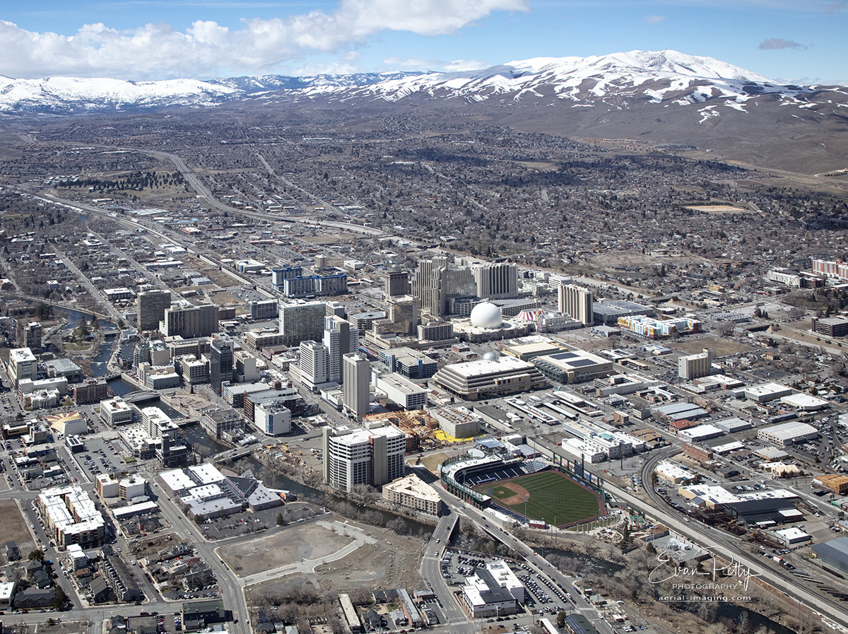 Downtown Reno NV Aerial view with Snow Mountains