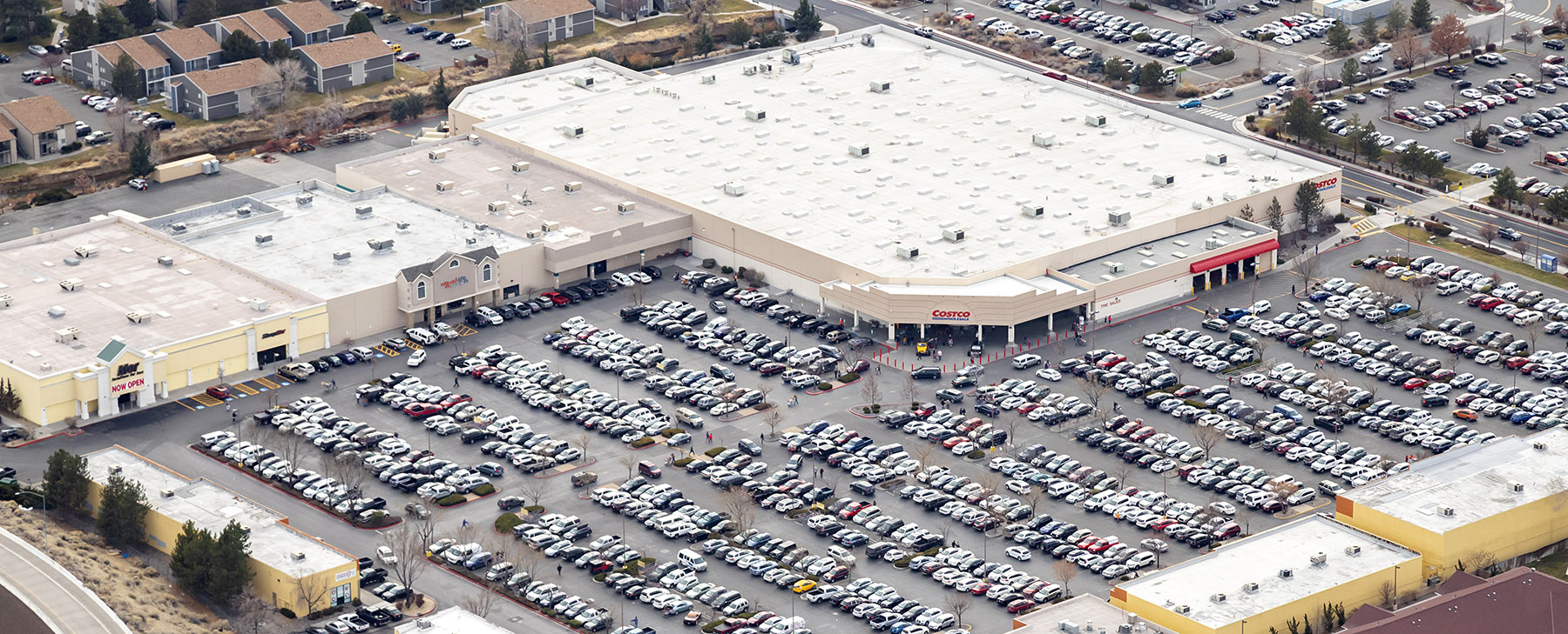 Shopping center aerial drone full parking lot