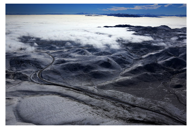 aerial view of road to the clouds