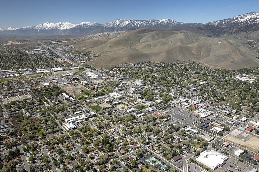 Aerial View Showing Snow-Capped Sierras Behind Downtown Carson City, NV