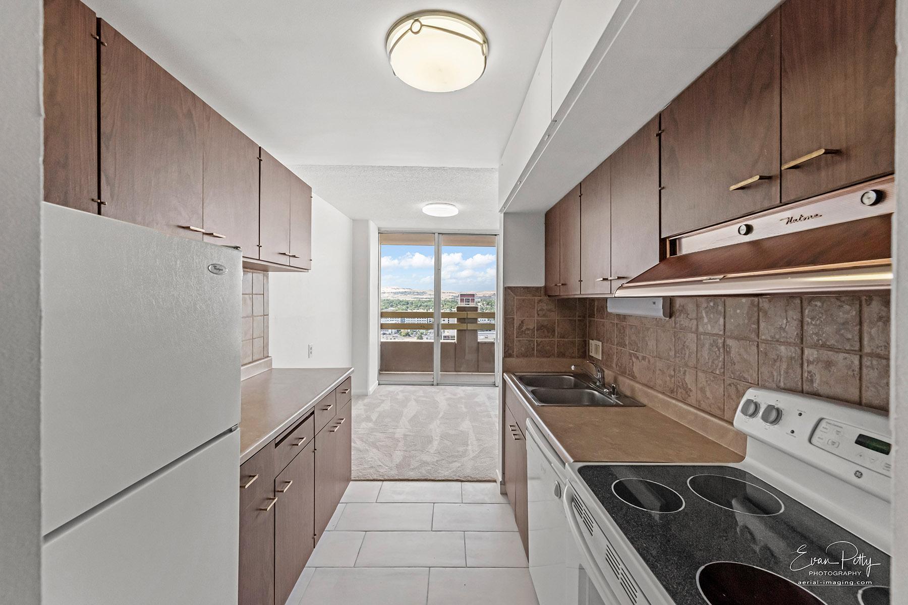 Alternate kitchen view showing countertops