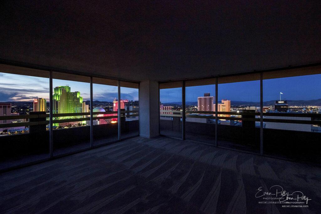 Window view of skyline at night