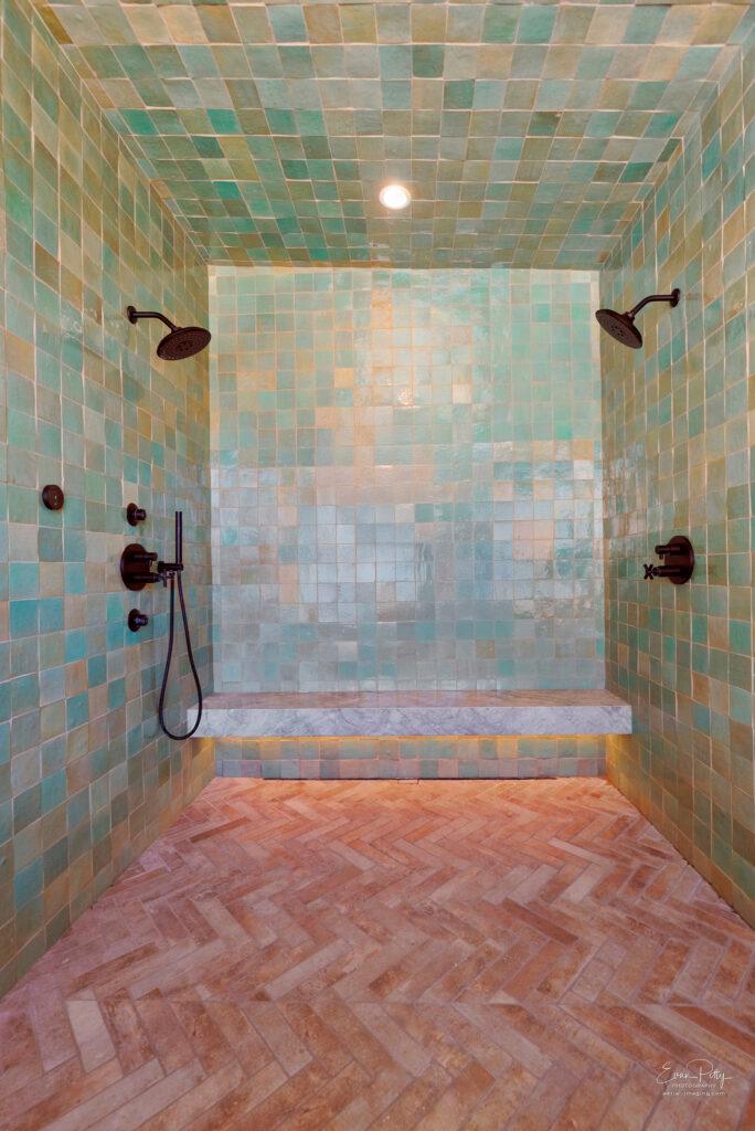Bathroom steam shower with tile surround.