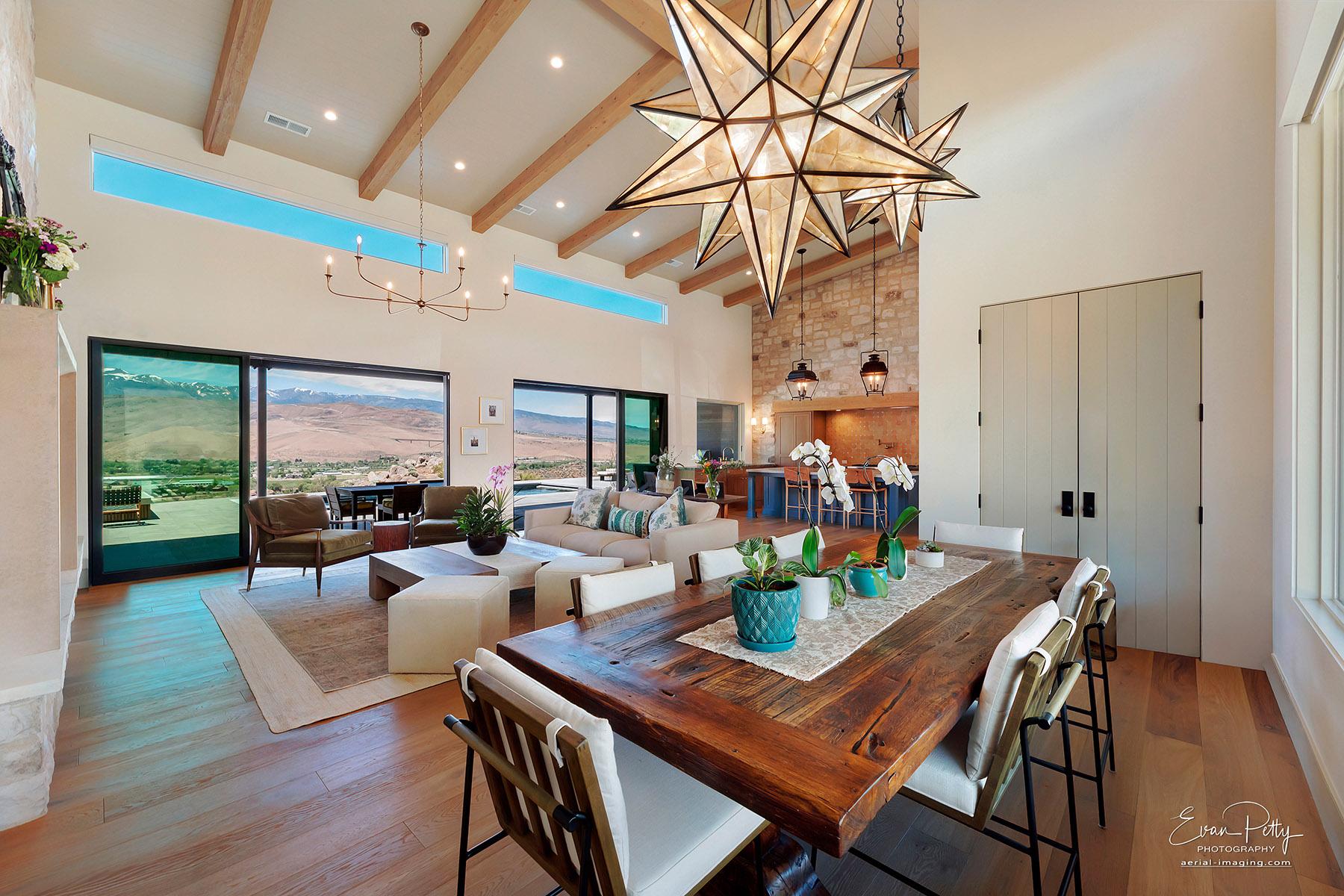 Dining room area with gorgeous lights and mountains views behind.