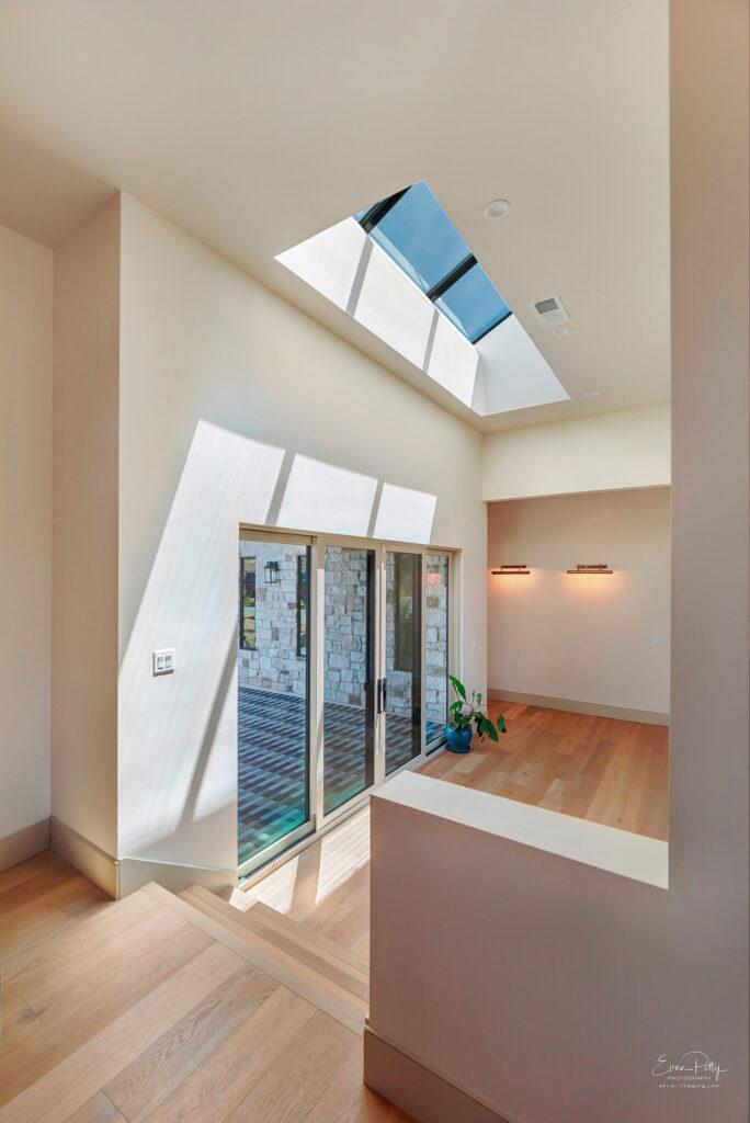 Hall view with skylights above.