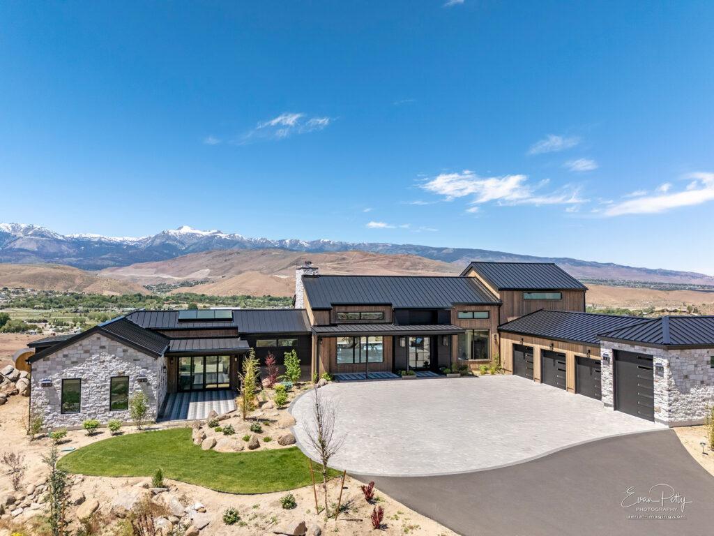 Drone view of the driveway and front of the house.